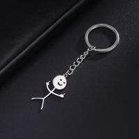 Cute Hollowed-out Smiling Face Figurine Pendant Stainless Steel Key Chain - Fun Gifts & More